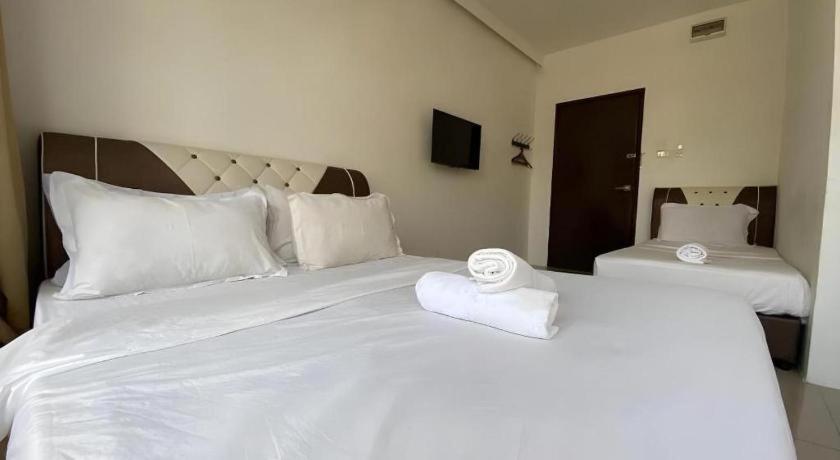 Sunsega Hotel Perai Bagian luar foto