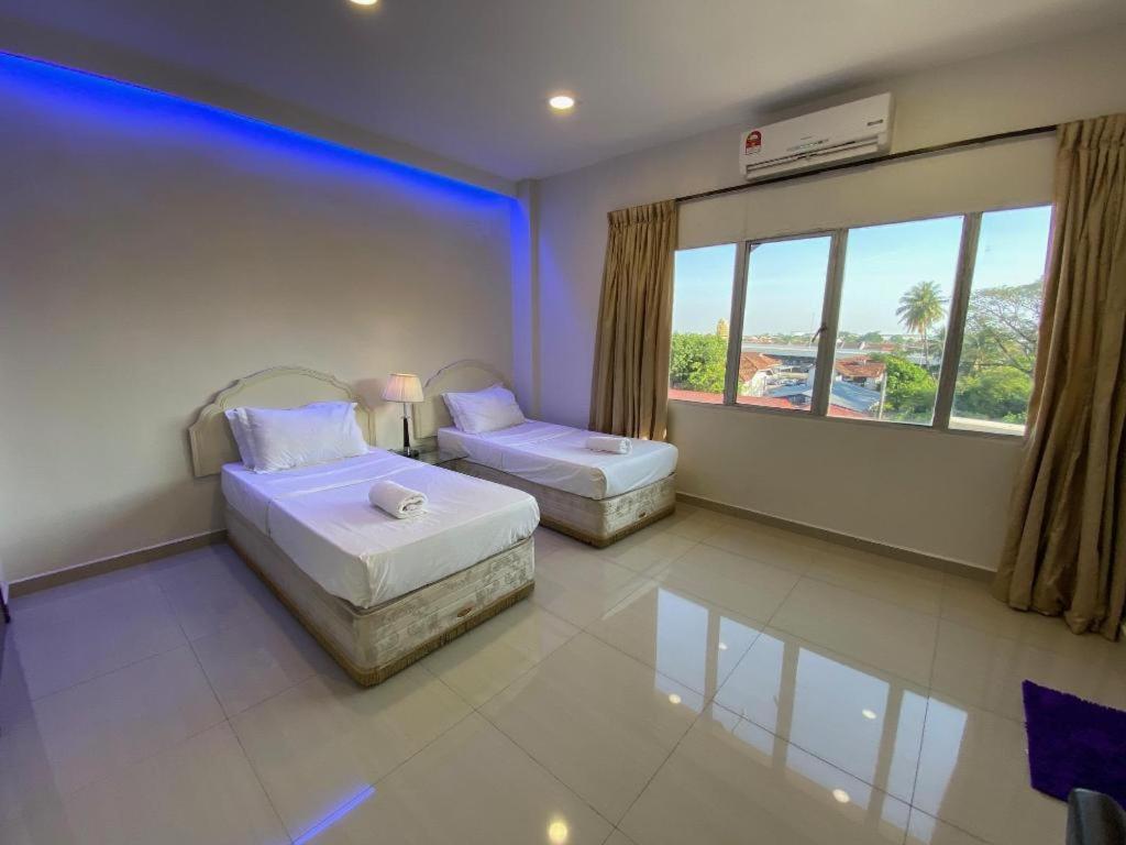 Sunsega Hotel Perai Bagian luar foto